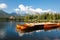 Mountain lake Strbske pleso and boats.