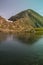 Mountain lake in summer time hiking