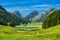Mountain lake in Switzerland Appenzell, Saemtisersee in the alpstein area. Hike, climb and enjoy in the Swiss mountains