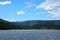 Mountain Lake with a Town and Ski Resort Mountain in the Distance