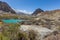 Mountain lake under the sunny day with blue sky along Karakorum Highway in Passu, Hunza district