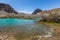Mountain lake under the sunny day with blue sky along Karakorum Highway in Passu, Hunza district