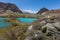 Mountain lake under the sunny day with blue sky along Karakorum Highway in Passu, Hunza district