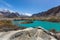 Mountain lake under the sunny day with blue sky along Karakorum Highway in Passu, Hunza district