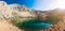 Mountain lake view between Bolkar Mountain and Taurus Mountain at sunset. Panoramic view of black lake. Nigde, Turkey. Volcanic