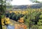 Mountain lake in woodlands in colourful fall foliage Ontario parks autumn colours landscape