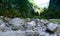 Mountain landscape with big stones on the road