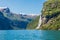 Mountain landscape with blue sky. Beautiful nature Norway. Geiranger fjord. Seven Sisters Waterfall