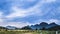 Mountain landscape with a dawn,Cute rural landscape tree, field, mountains . landscape of mountains and meadow .Prachubkeereekhan