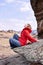 Mountain landscape. Girl tourist. Blue sky