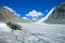 Mountain landscape with glacier and stone screes