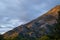 Mountain landscape with golden peak