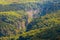 Mountain landscape. Gorge and mountains covered by forest