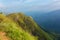 Mountain landscape, green slopes. Beauty of mountains. Little Adam peak, mountain in the fog view from the jungle