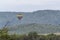 Mountain landscape with hot air balloon