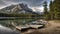 Mountain landscape with lake and canoes