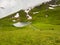 Mountain landscape. Lake in the highlands of the Caucasus. Spring bright color