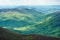 Mountain landscape. Mountain peaks. Light spots. Carpathian Mountains, Ukraine.