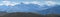 Mountain landscape, panoramic view, peaks in haze