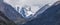 Mountain landscape, panoramic view. Snow-capped peaks, glaciers. Mountain climbing