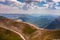 Mountain landscape with a road and a mountain shelter, beautiful nature