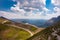 Mountain landscape with a road and a mountain shelter, beautiful nature