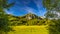 Mountain landscape with rocky peaks on background in summer time