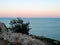 Mountain landscape with sea views. Wild bush on a hill overlooking the sea.