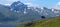 Mountain landscape and shepherd on horse.