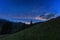 Mountain landscape, starry summer night in alpine countryside