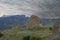 Mountain landscape, stone pillars in the form of ghosts, stone idols in a mountain valley, a canyon against the sky