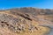 Mountain landscape with stone scree on the mountainside.