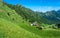 Mountain landscape in summer with characteristic barns in Trentino Alto Adige. View from Passo Rolle, Italian Dolomites, Trento, I