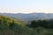 Mountain landscape. Sunny summer day in the wooded mountains