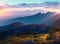 Mountain landscape at sunset. Sunrise in the mountains. Dramatic sky. Generated AI
