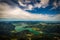 Mountain landscape on the top of the hiking trail to the Schafberg and view of landscape over the Mondsee lake