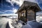 Mountain landscape with traditional wooden hut