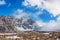 Mountain landscape view in Kyrgyzstan. Rocks, snow and stones in mountain valley view. Mountain panorama.