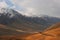 Mountain landscape view in Kyrgyzstan. Rocks, snow and stones in mountain valley view. Mountain panorama. Kyrgyz Alatoo mountains,