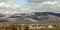 Mountain landscape and village in the valley, foothills, Crimea Simferopol, resort regions, sky and clouds, fields and grass, in s