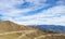 Mountain landscape with white sutra streamer scattered on the gr