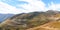 Mountain landscape with white sutra streamer scattered on the gr