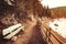 Mountain landscape, wooden bench and trail