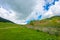 Mountain landscape with wooden fence, Kyrgyzstan.