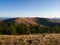 The mountain landscape of the Zlatibor mountain in Serbia seen from the mountain peak Crni vrh