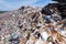 Mountain large garbage pile and pollution,Pile of stink and toxic residue,These garbage come from urban and industrial