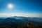 Mountain layer and sun on above blue sky landscape