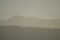 Mountain layers of the andean precordillera pre-mountain range and the cordillera at sunset, San Juan, Argentina