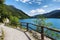 Mountain Ledro lake and bike path in the Italian Dolomites