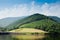 Mountain and maeping river landscape